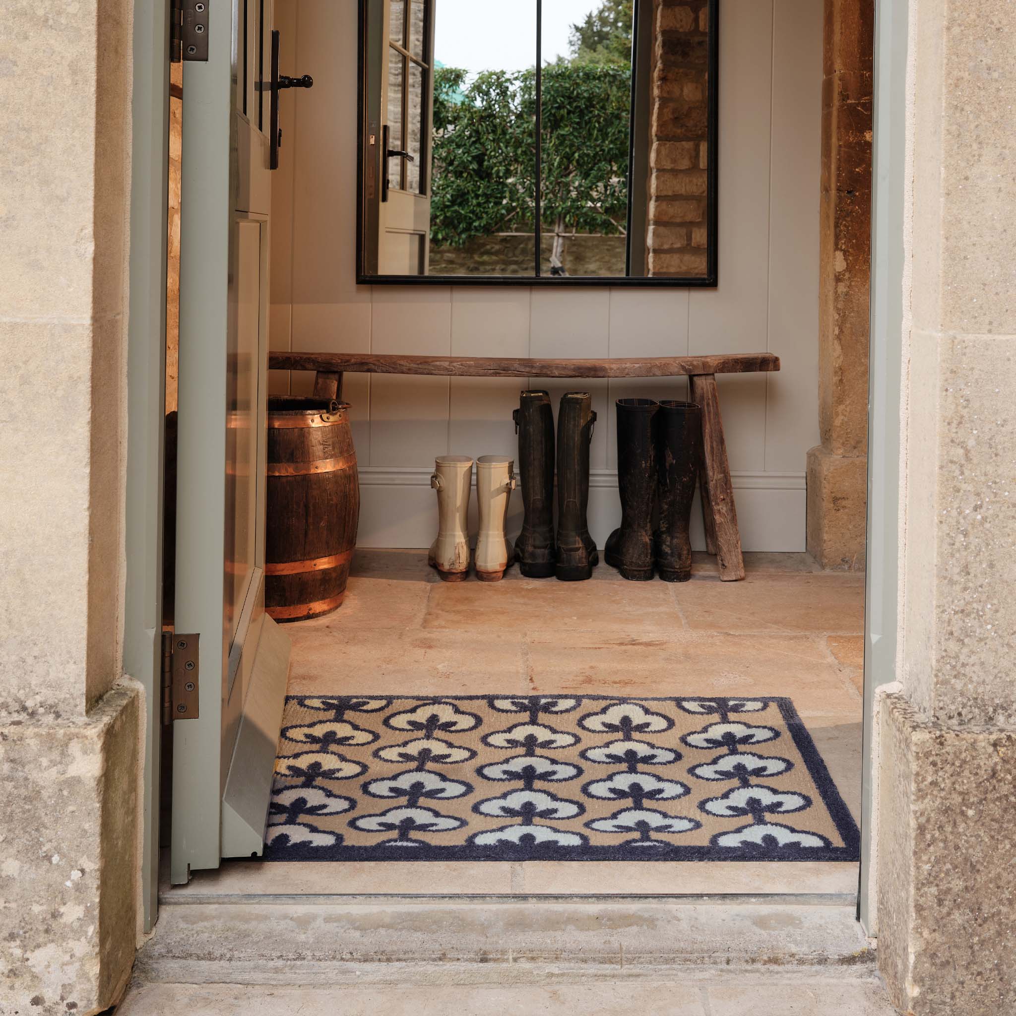 Retro Flower Neutral Doormat- 100% recycled cotton doormat featuring a retro floral pattern.