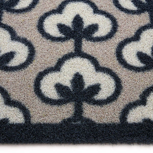 Retro Flower Neutral Outdoor Doormat- made from regenerated nylon featuirng retro flowers.