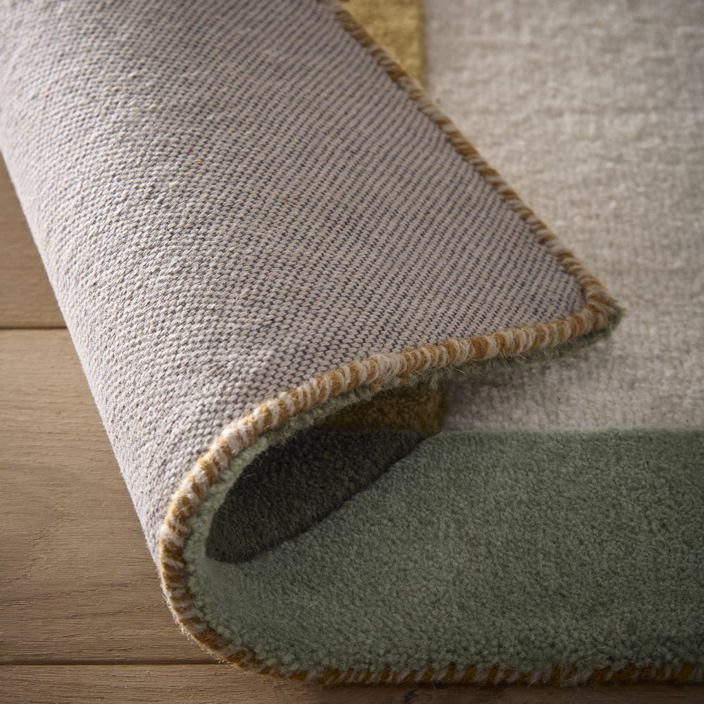 Retro Deco - 100% wool cut loop pile, hand-tufted and carved with a geometric pattern. 