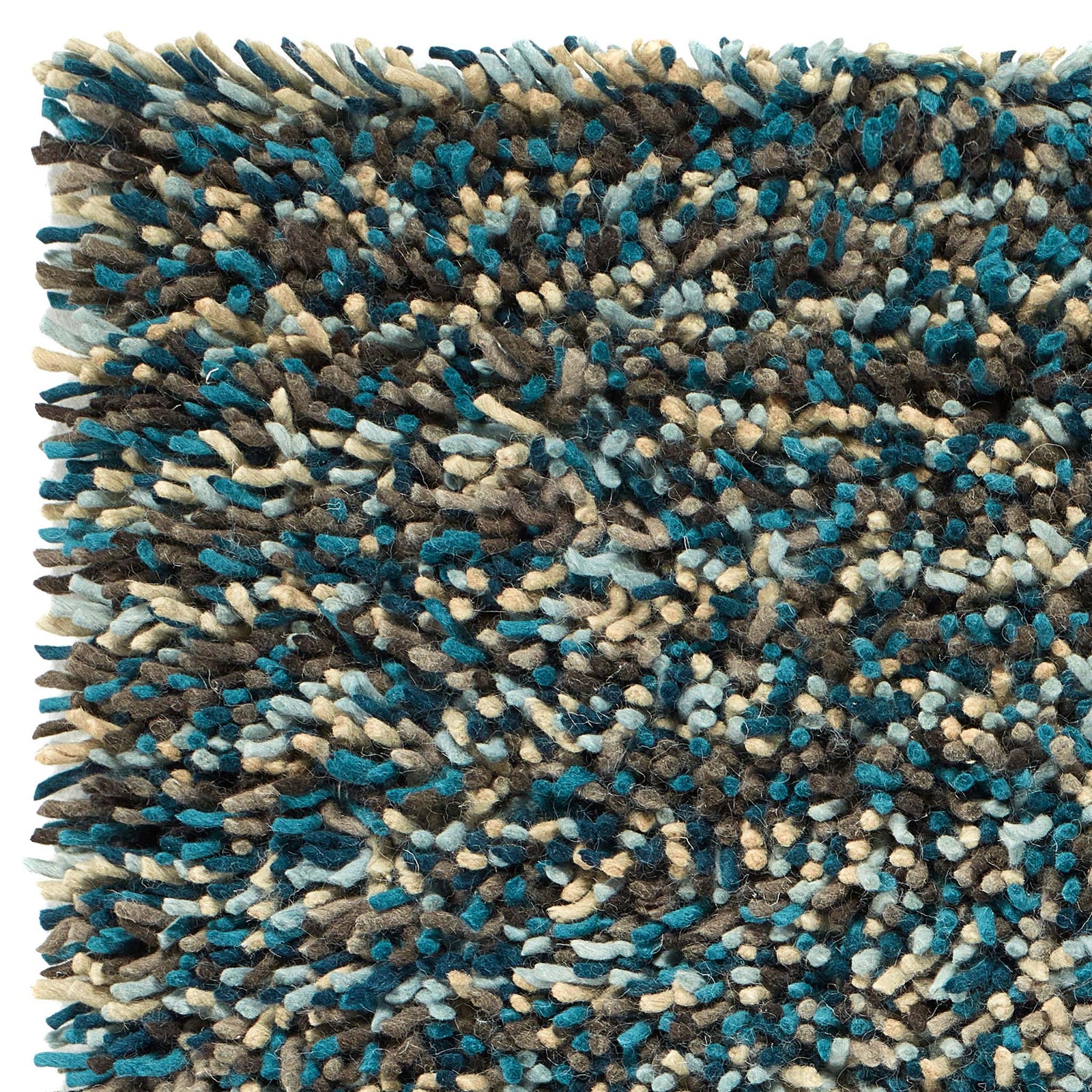 Rocks Shaggy Blue - a 100% wool blue rug featuring a shaggy fleck pattern.