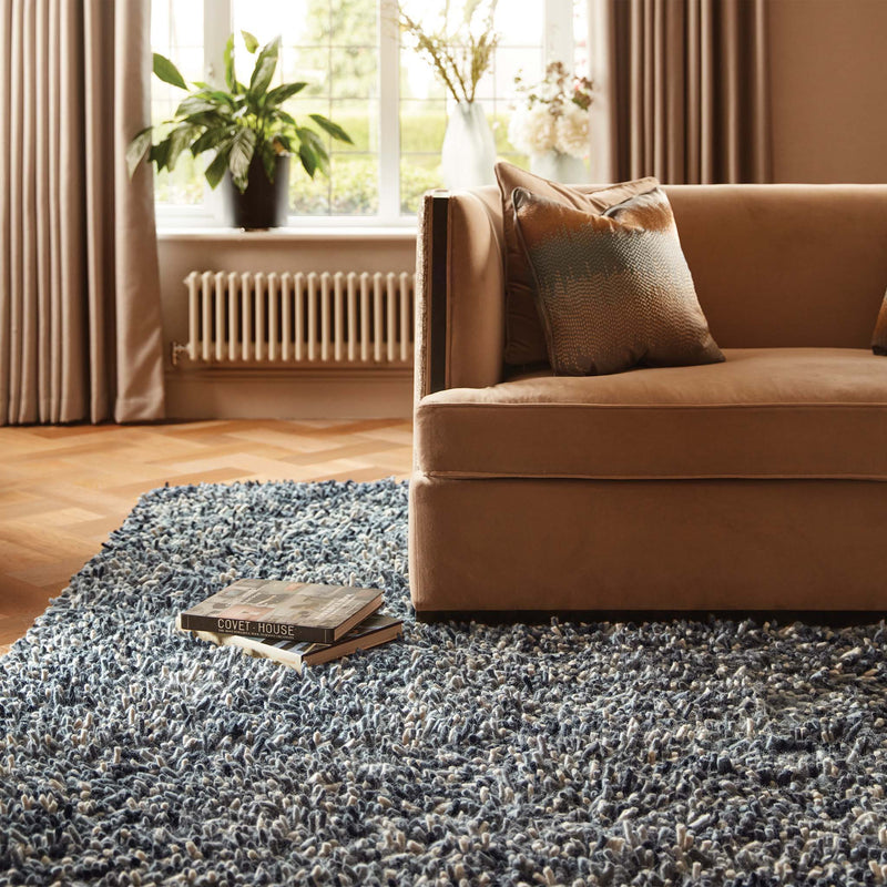 Rocks Shaggy Grey Rug - a 100% wool grey rug featuring a shaggy fleck pattern.