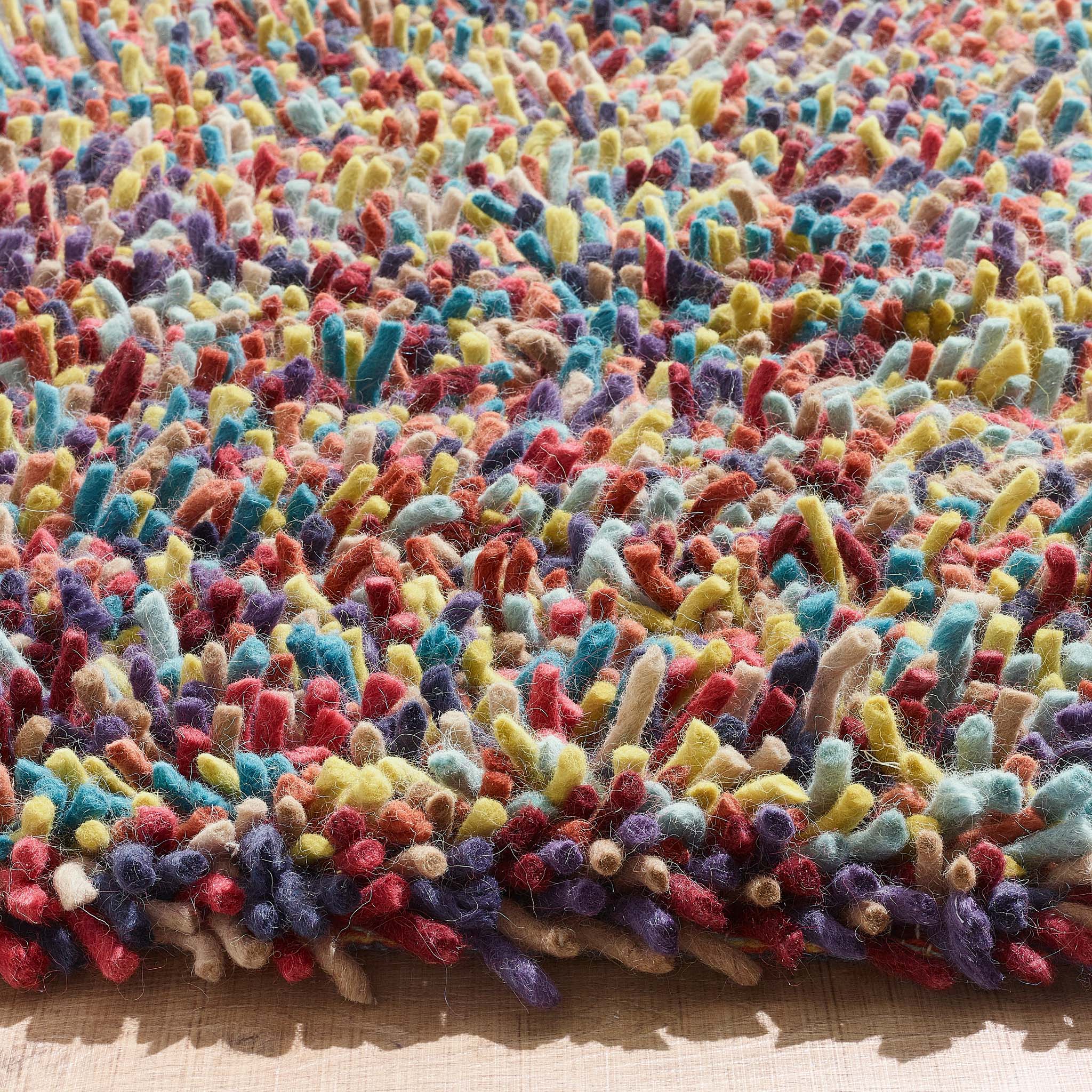 Rocks Shaggy Multi Rug - a 100% wool multi rug featuring a shaggy fleck pattern.