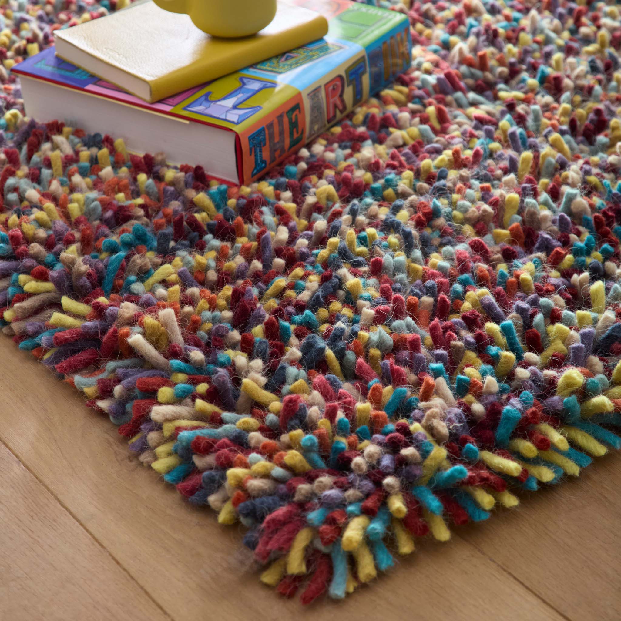 Rocks Shaggy Multi Rug - a 100% wool multi rug featuring a shaggy fleck pattern.