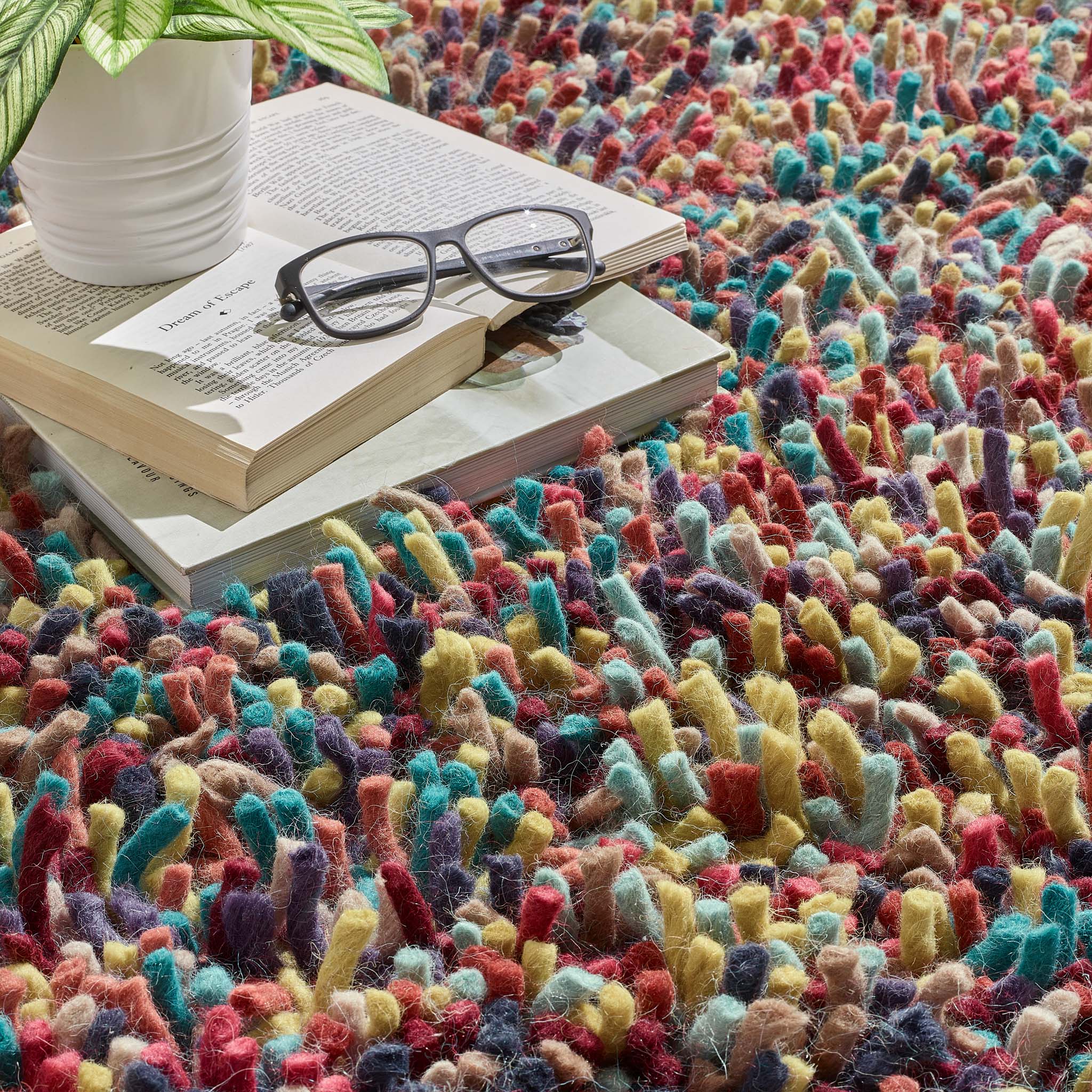 Rocks Shaggy Multi Rug - a 100% wool multi rug featuring a shaggy fleck pattern.