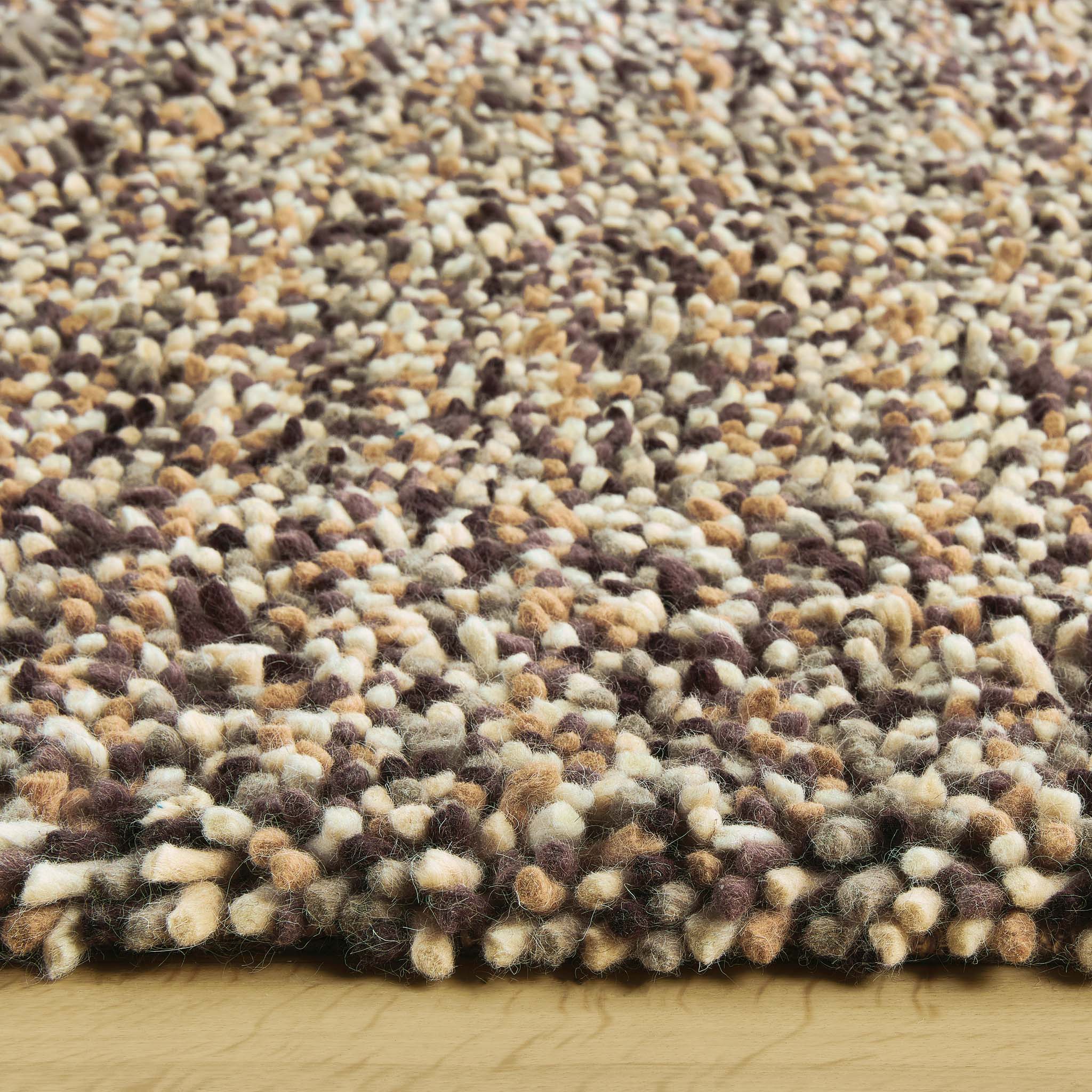 Rocks Shaggy Natural Rug - a 100% wool light brown rug featuring a shaggy fleck pattern.