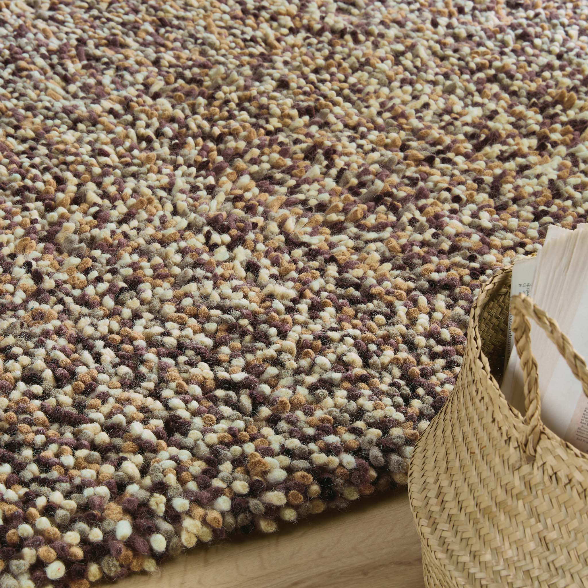 Rocks Shaggy Natural Rug - a 100% wool light brown rug featuring a shaggy fleck pattern.