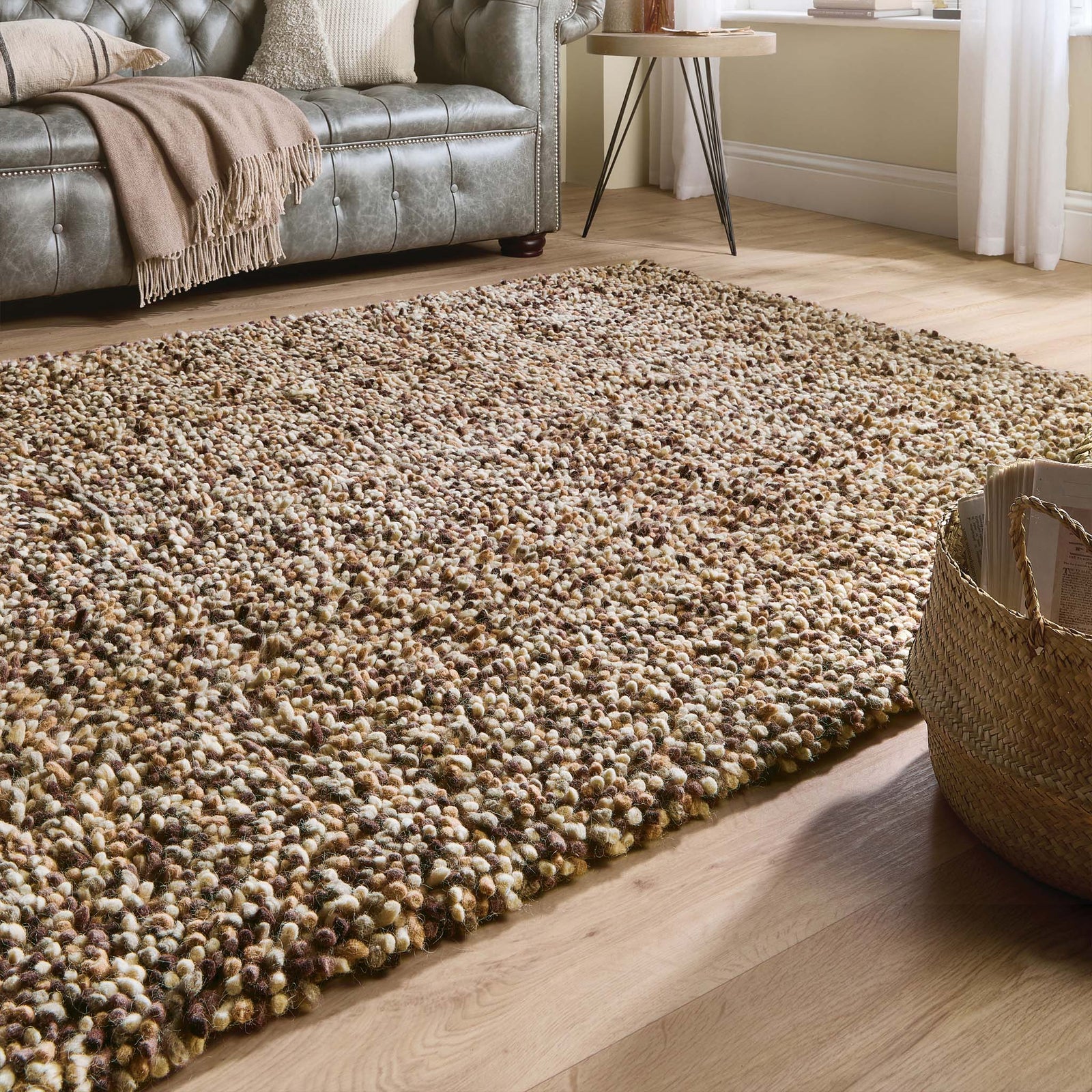Rocks Shaggy Natural Rug - a 100% wool light brown rug featuring a shaggy fleck pattern.