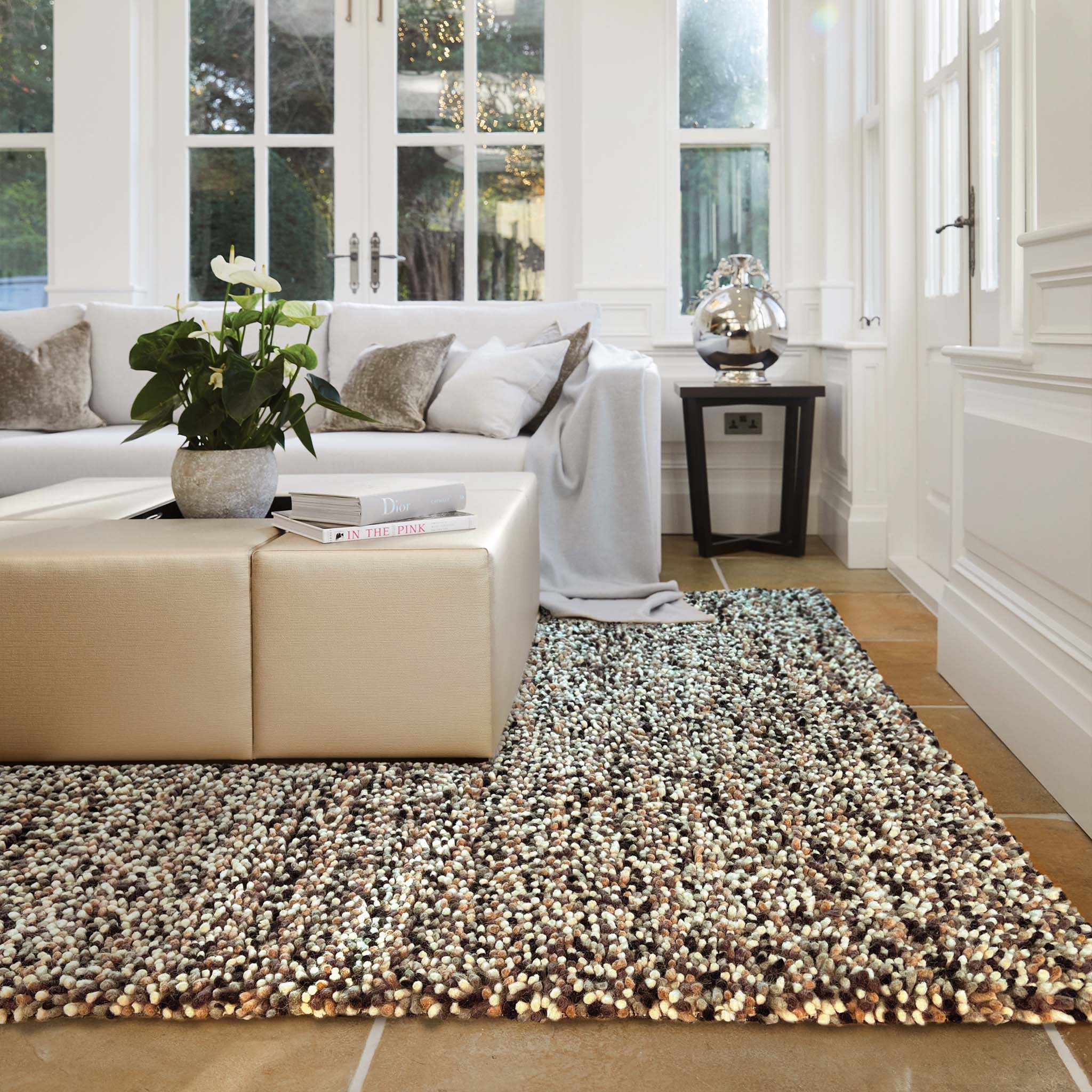 Rocks Shaggy Natural Rug - a 100% wool light brown rug featuring a shaggy fleck pattern.