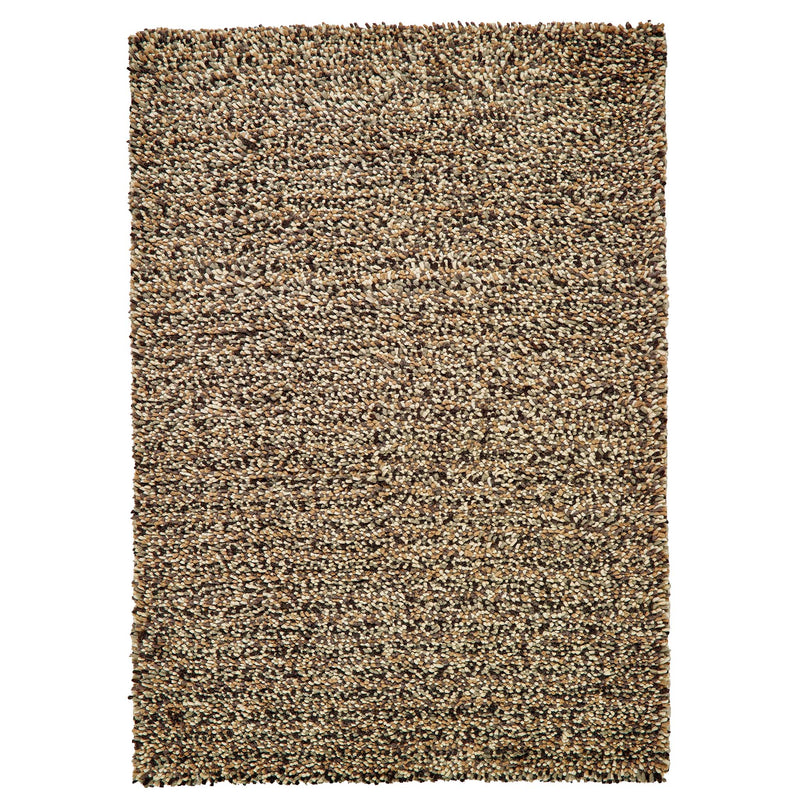 Rocks Shaggy Natural Rug - a 100% wool light brown rug featuring a shaggy fleck pattern.