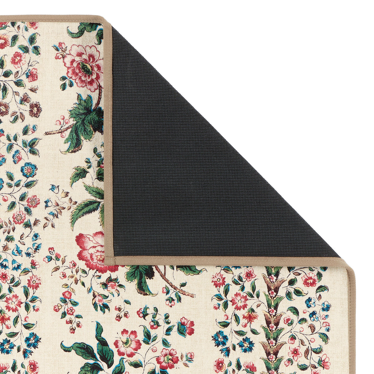 Rose Pergola Chintz Eco-Washable with a floral design showing the rubber backing. 