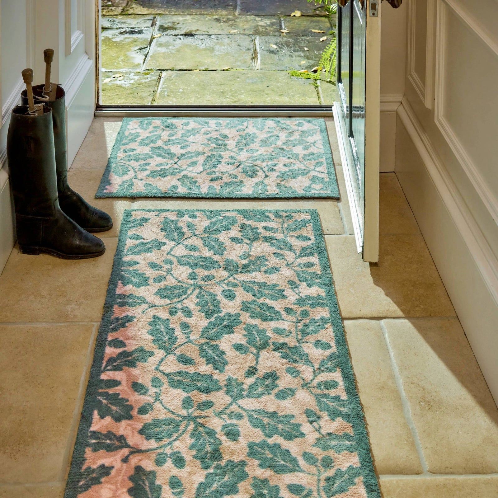 Discover the Royal Oak Washable Runner- a 100% recycled cotton runner featuring pattern of green oak leaves. 