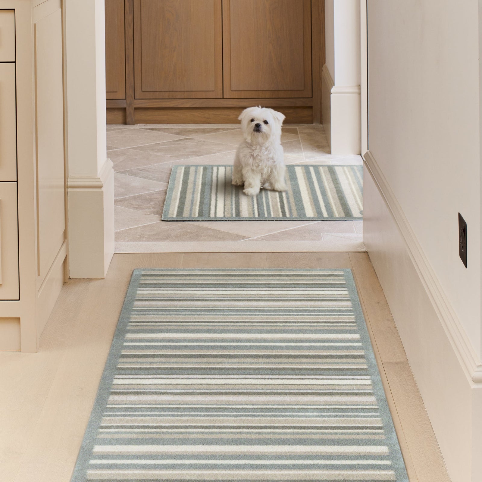 Sage Stripe Washable Runner- a 100% recycled cotton runner featuring a muted striped design. 