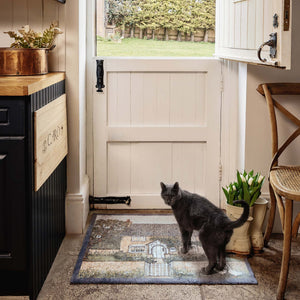 Country Cottage Washable Doormat- made from eco-friendly material featuring a countryside cottage design.