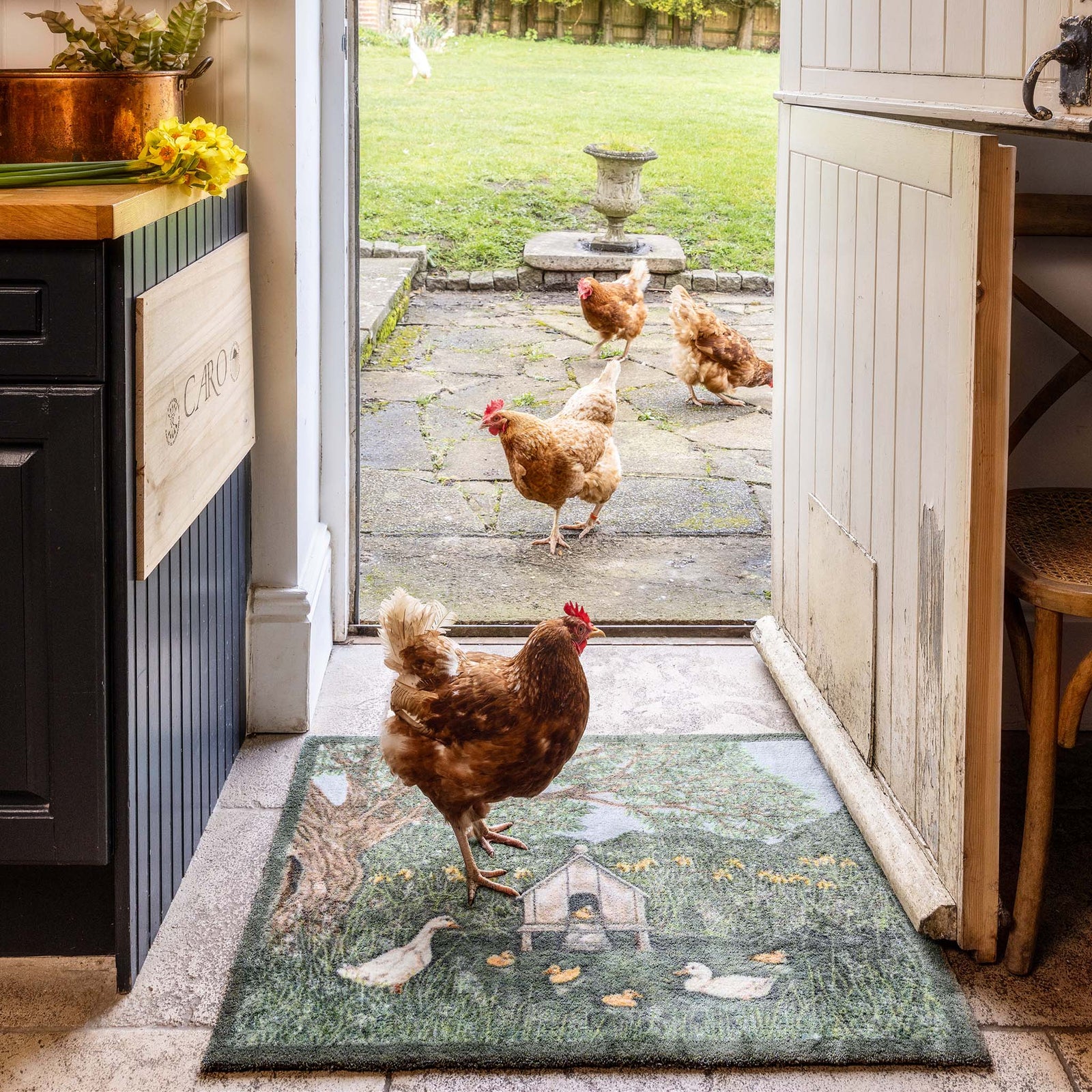 Duck House Washable Doormat- made from eco-friendly materials featuring a duck house. 
