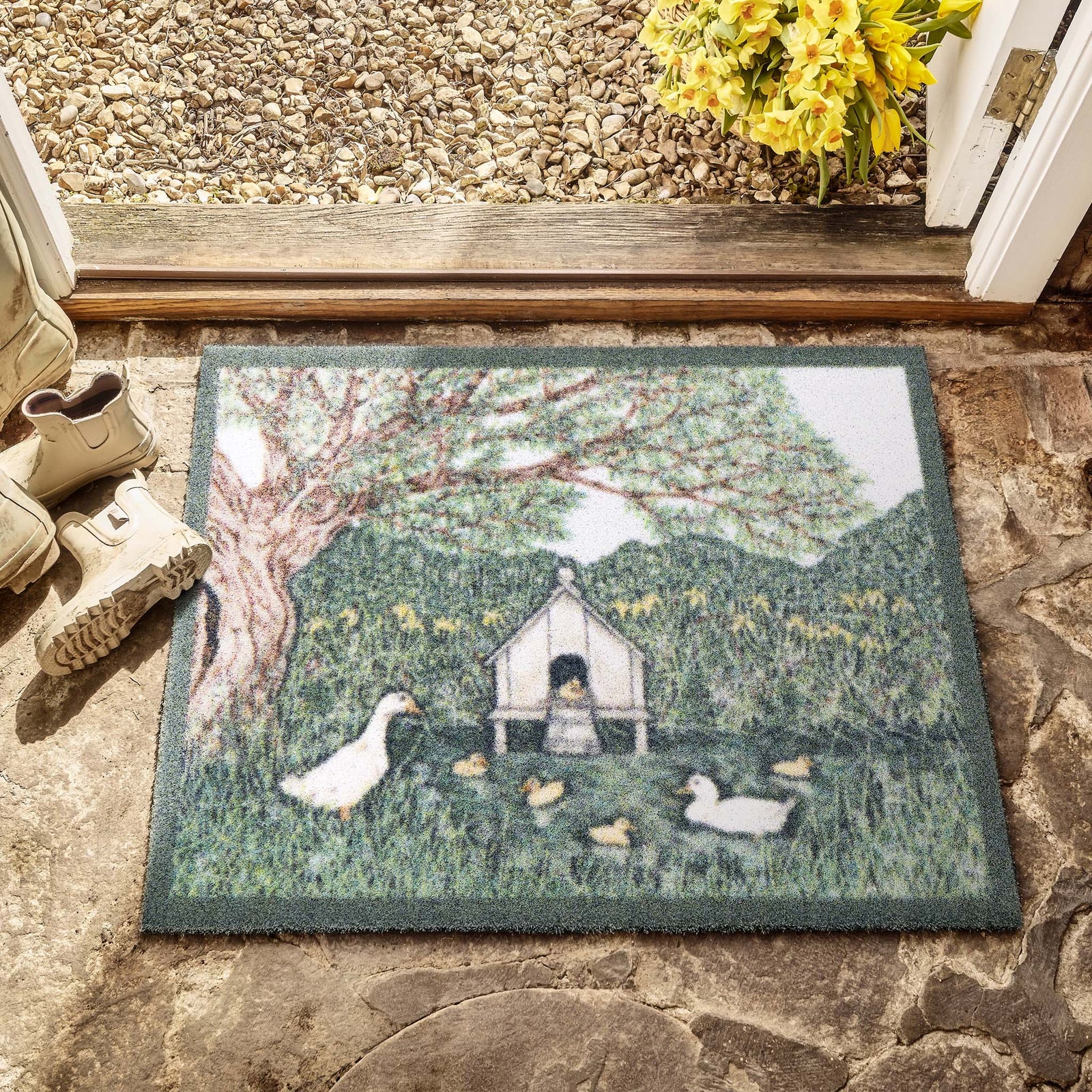Duck House Outdoor Doormat- made from recycled materials featuring a duck house. 