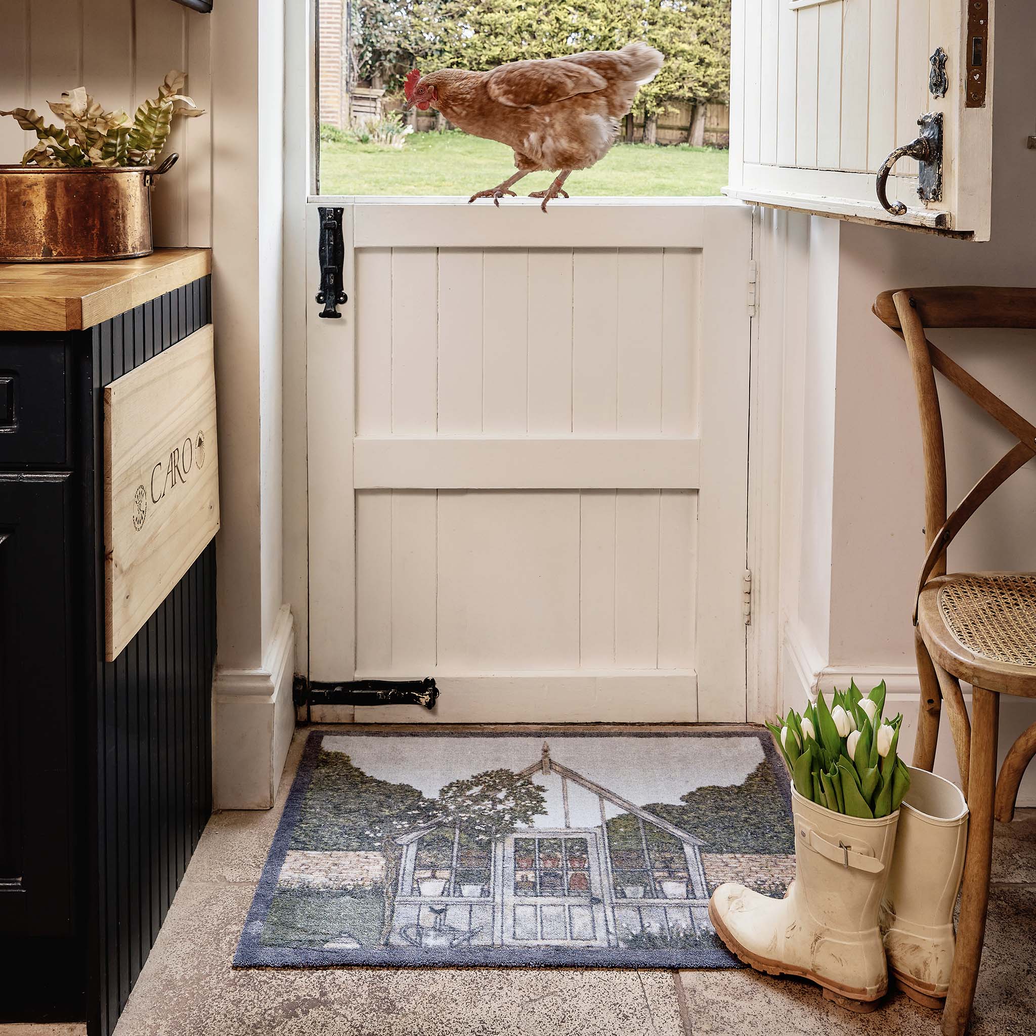 Green House Washable Doormat- made from eco-friendly materials featuring a greenhouse. 