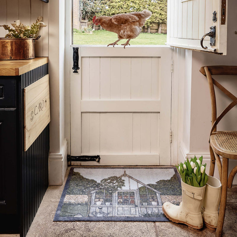 Green House Washable Doormat- made from eco-friendly materials featuring a greenhouse. 