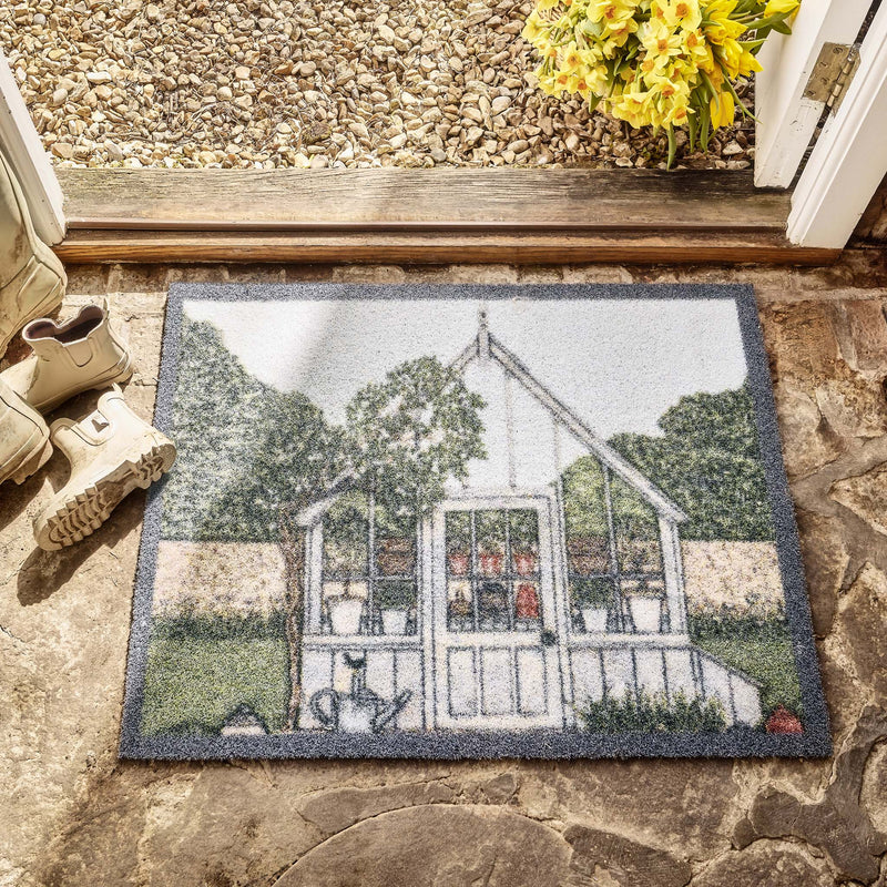 Green House Outdoor Doormat- made from recycled materials featuring a greenhouse. 