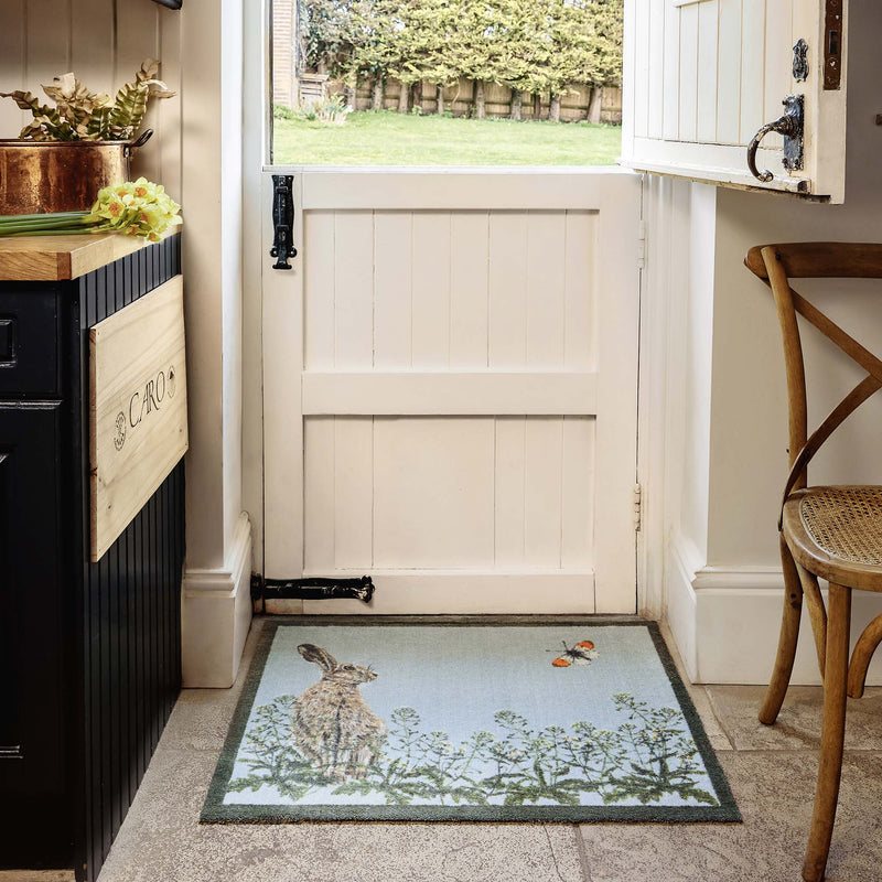 Hare & Shepard's Purse Washable Doormat- made from eco-friendly materials featuring a hare chasing a butterfly. 