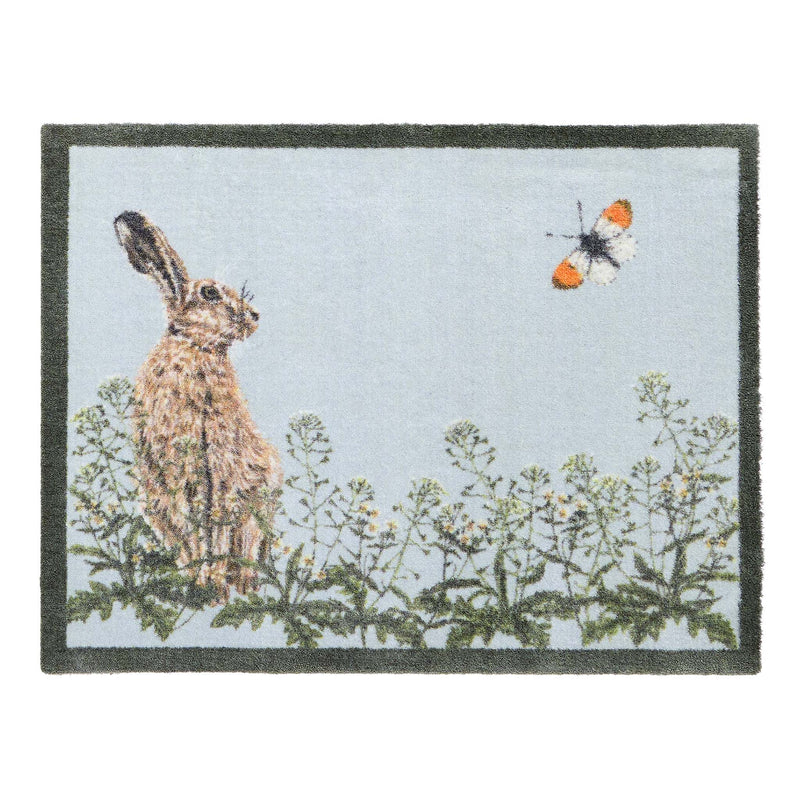 Hare & Shepard's Purse Washable Doormat- made from eco-friendly materials featuring a hare chasing a butterfly. 