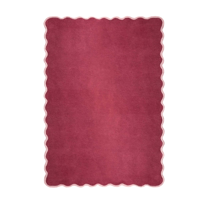 Scalloped Elise Coral Rug - 100% wool rug in dark pink with a lighter pink scalloped border. 