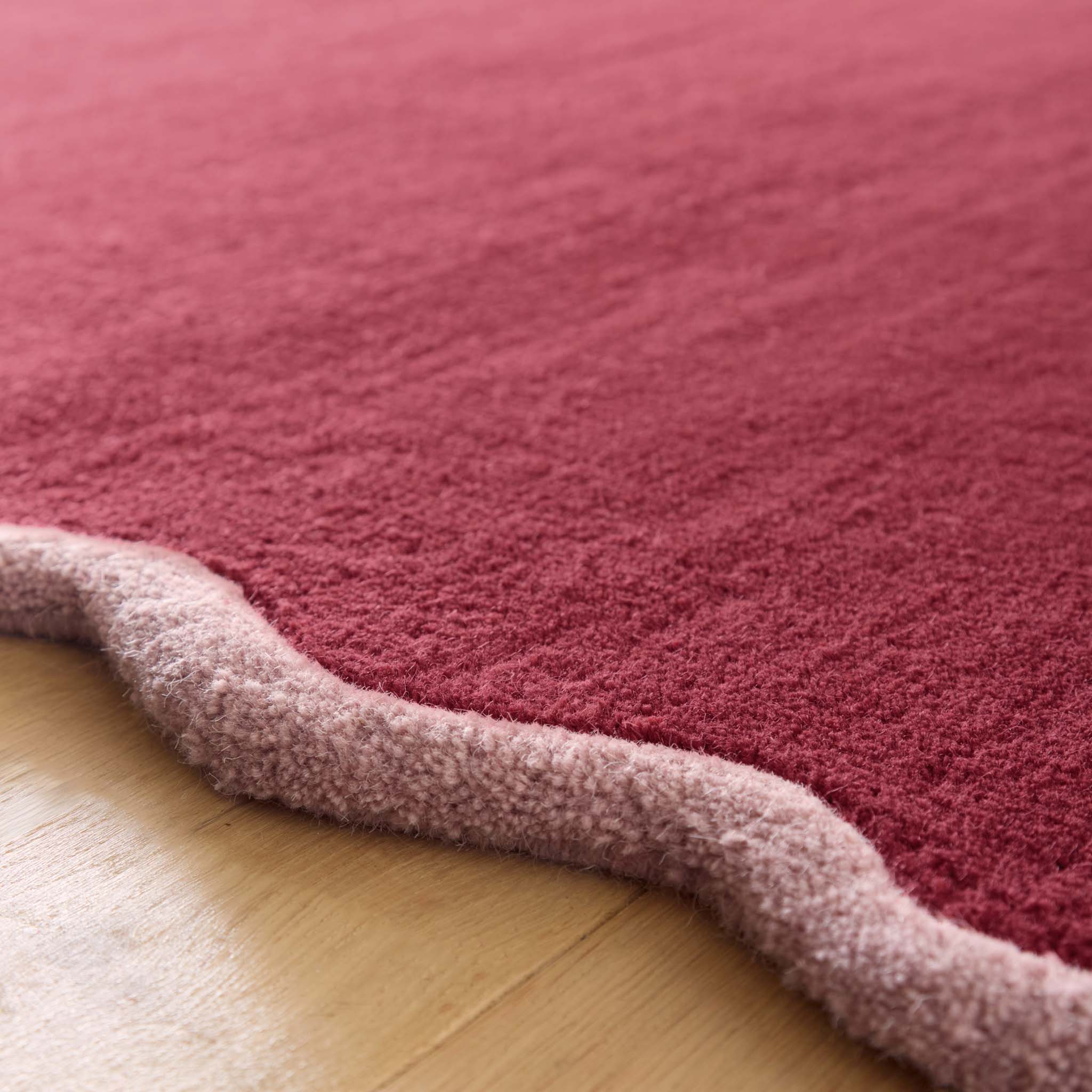 Scalloped Elise Coral Runner - 100% wool runner in dark pink with a lighter pink scalloped border. 