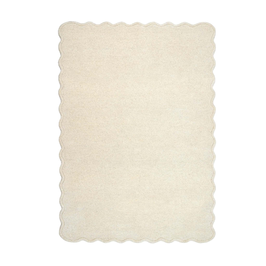Scalloped Elsie Rug Cream- 100% wool rug featuring a wavy border.