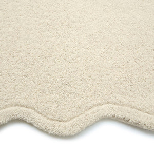Scalloped Elsie Rug Cream- 100% wool rug featuring a wavy border.