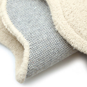Scalloped Elsie Rug Cream- 100% wool rug featuring a wavy border.