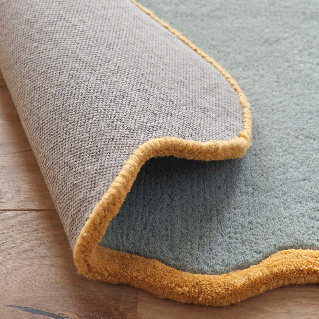 Scalloped Elise Duck Egg Rug Runner- 100% wool runner in duck egg featuring a wavy border.