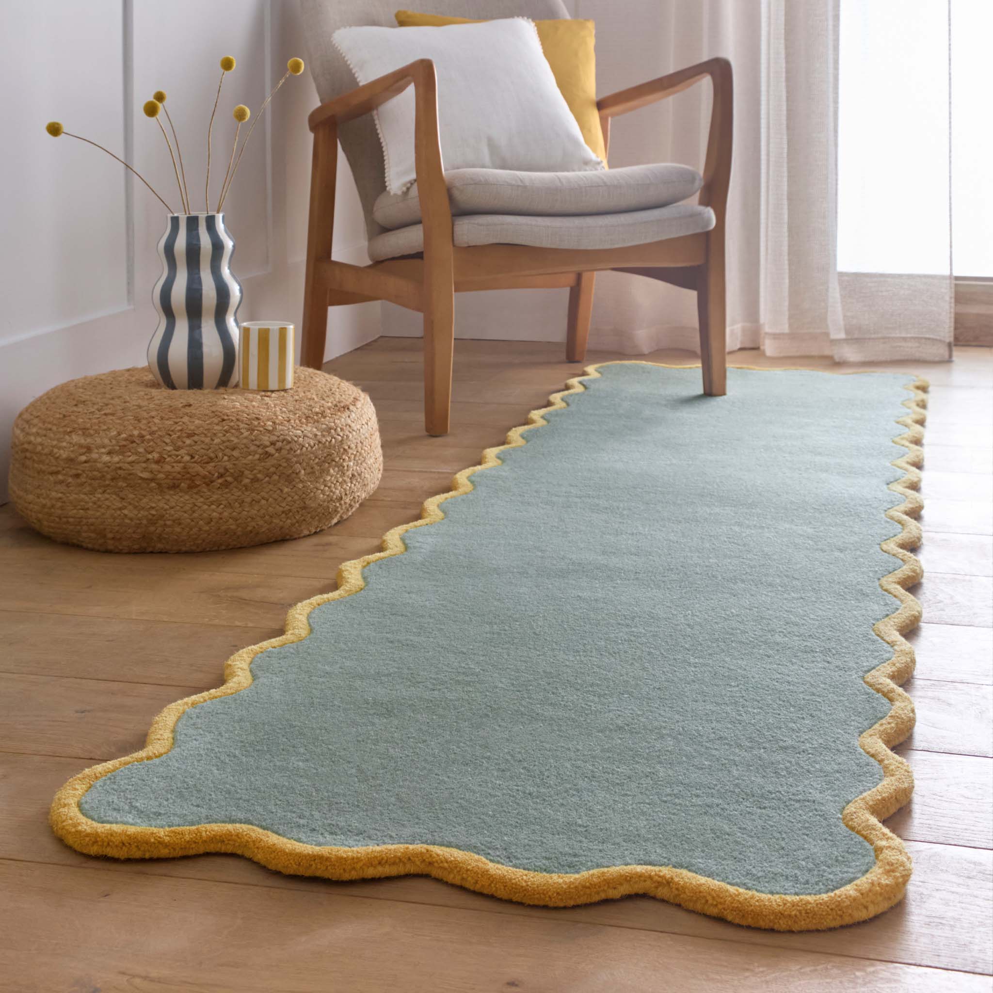 Scalloped Elise Duck Egg Ochre Runner - a 100% wool blue runner featuring a scalloped yellow border. 