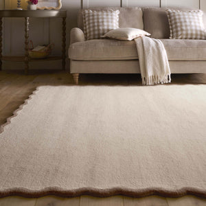 Scalloped Elsie Rug Natural/Brown- 100% wool rug with a natural brown wavy border.