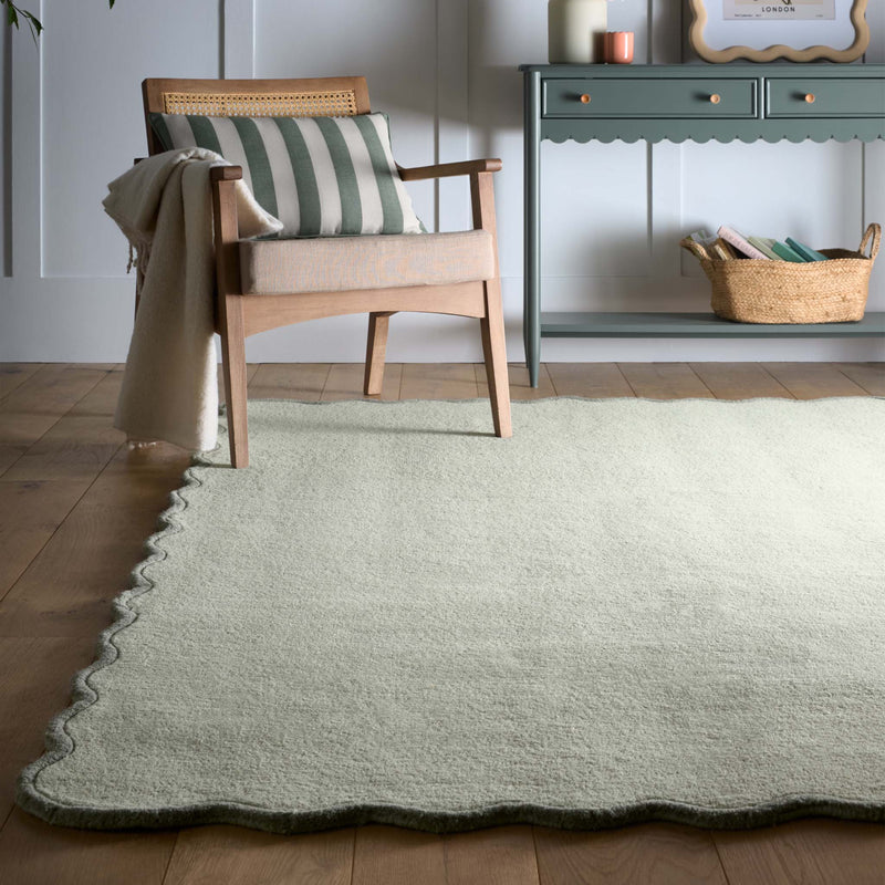 Scalloped Elsie Rug Sage\Seagrass- 100% wool rug featuring a wavy border.