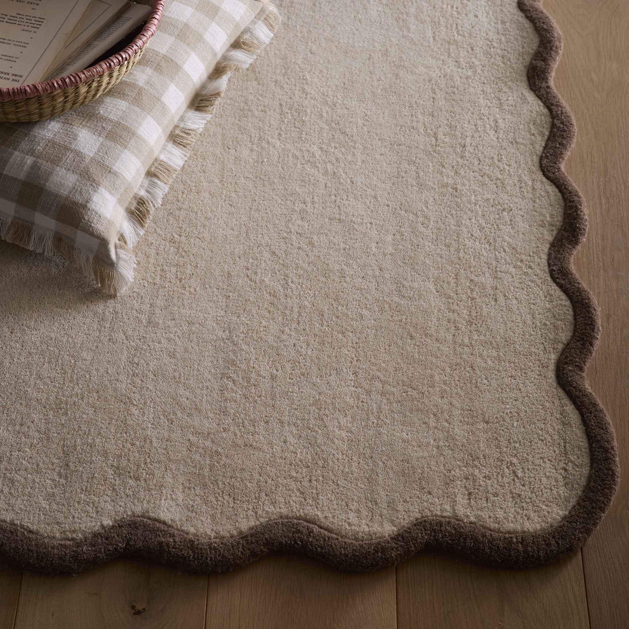 Scalloped Elise Rug in Natural and Brown- a 100% wool cut, loop pile rug with a wavy  border. 