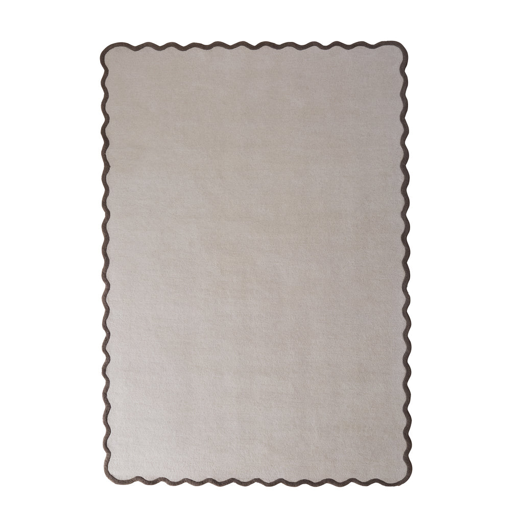 Scalloped Elise Rug in Natural and Brown- a 100% wool cut, loop pile rug with a wavy  border. 