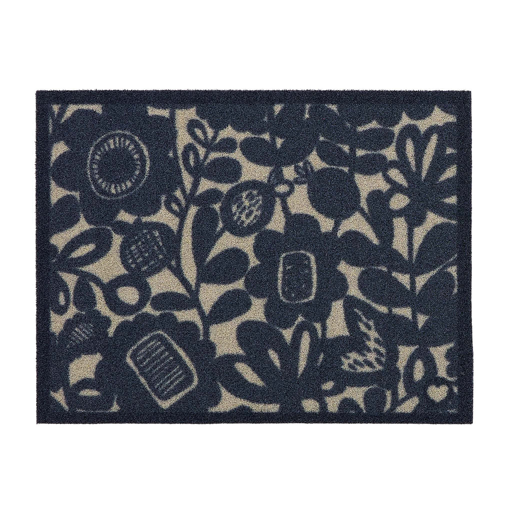 Kukkia Dark Navy Outdoor Doormat. Made from ECONYL regenerated yarn featuring a navy floral pattern.