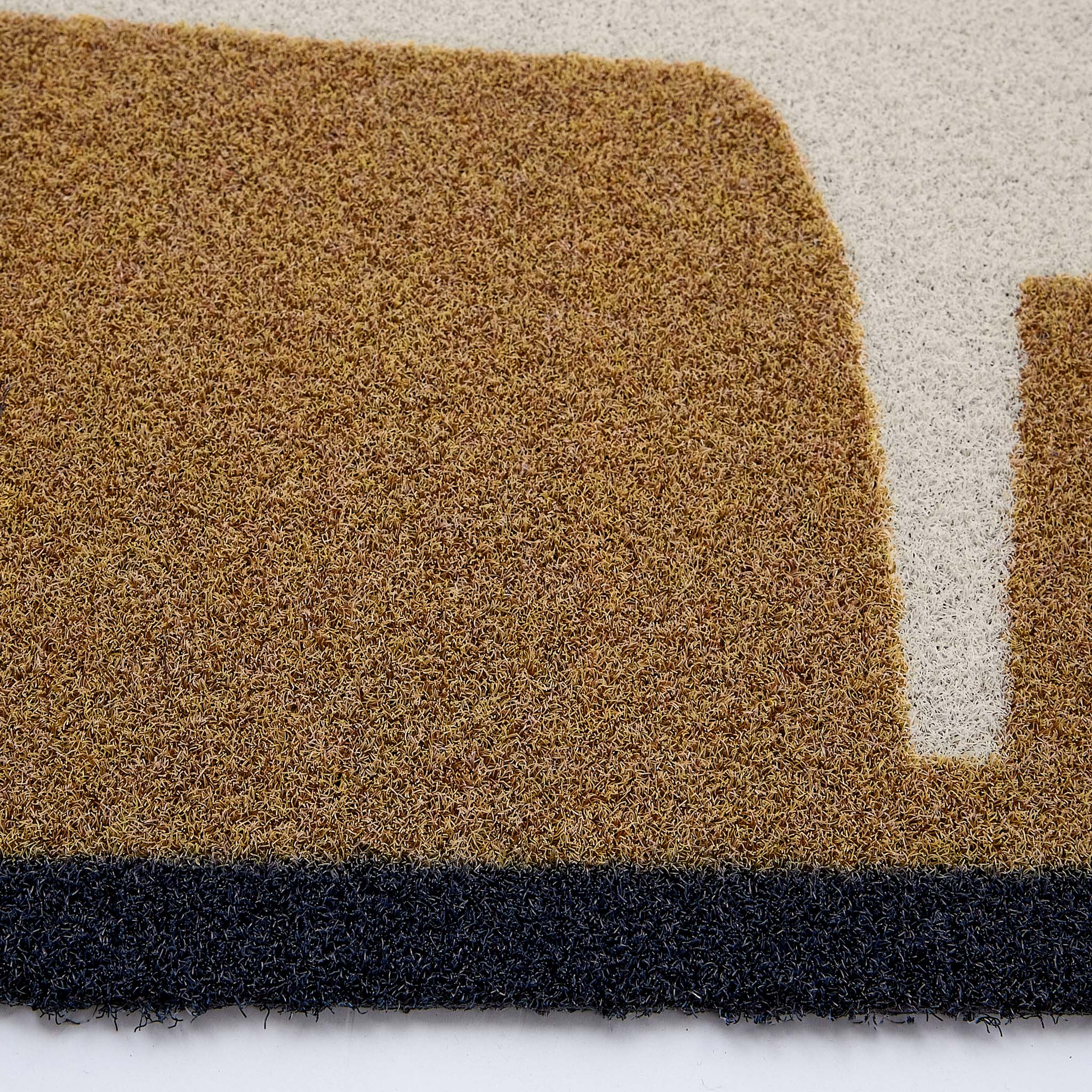 Scion Mr Fox Natural Outdoor Doormat with a white fox design, styled with backing showing.