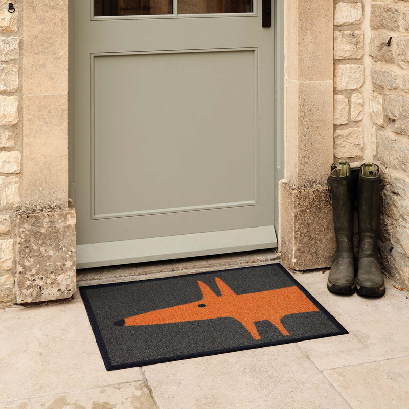 Mr Fox Orange Outdoor Doormat. Made from ECONYL regenerated yarn featuring an orange fox.