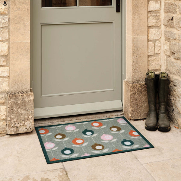 Pepino Green Outdoor Doormat. Made from ECONYL regenerated yarn featuring a floral pattern.