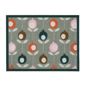 Pepino Green Outdoor Doormat. Made from ECONYL regenerated yarn featuring a floral pattern.