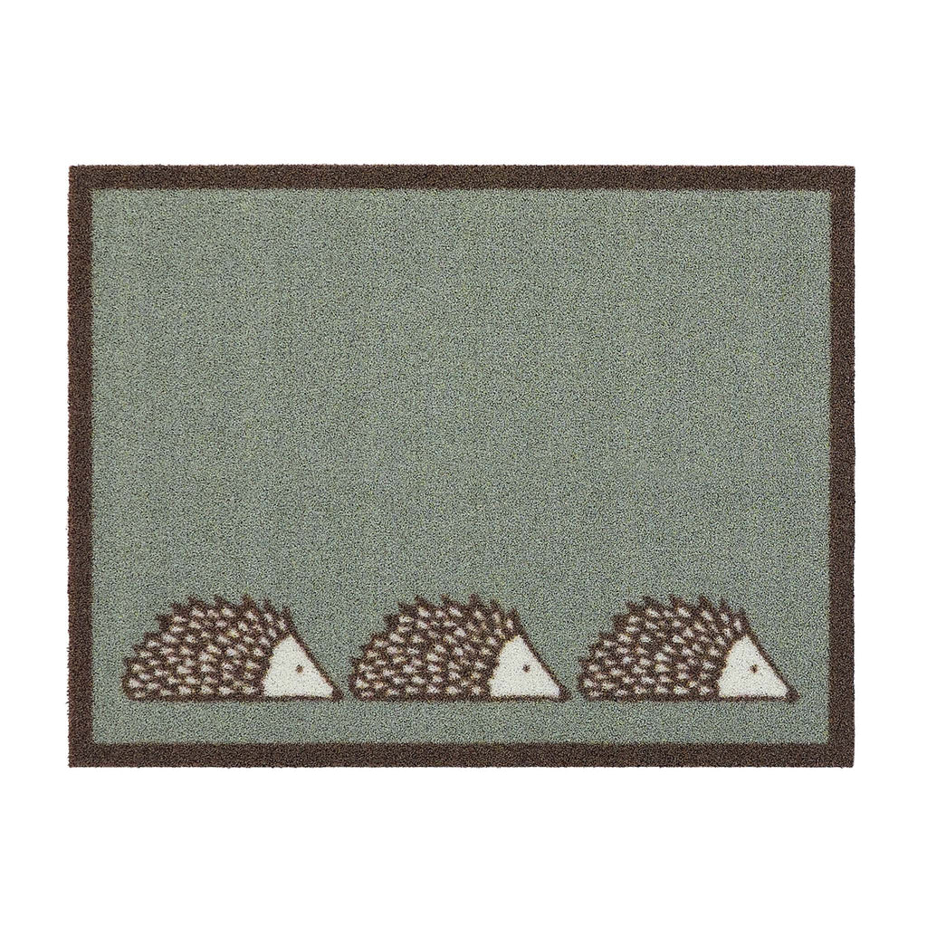 Spike Green Outdoor Doormat. Made from ECONYL regenerated yarn featuring three hedgehogs.