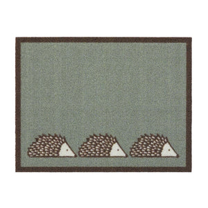 Spike Green Outdoor Doormat. Made from ECONYL regenerated yarn featuring three hedgehogs.