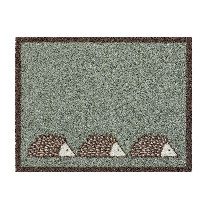 Spike Green Outdoor Doormat. Made from ECONYL regenerated yarn featuring three hedgehogs.