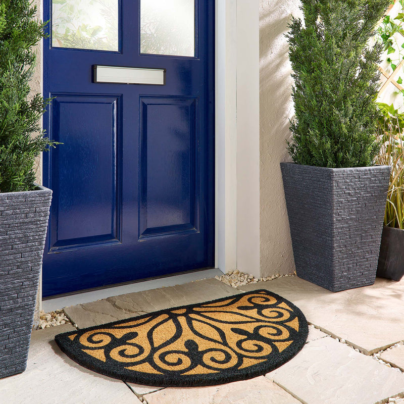 Scroll Coir Doormat made from natural coconut fibres, featuring a black swirl design.