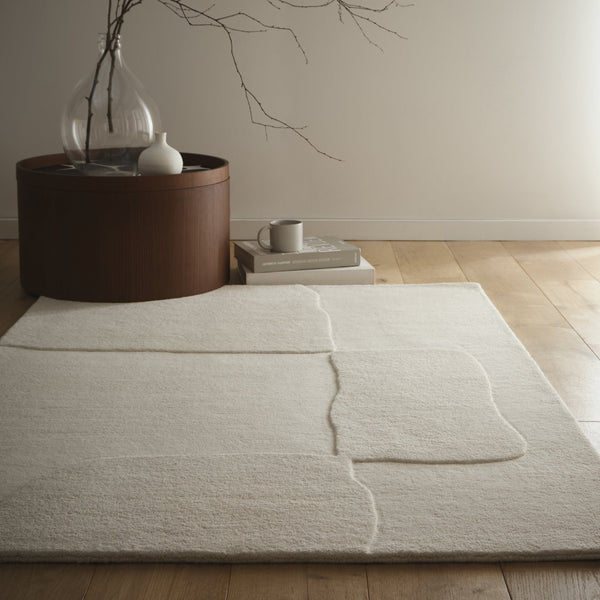 Sculptured Wool Boulder Rug- a 100% wool cut pile rug in Cream with a patterned design. 