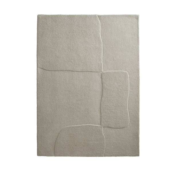 Sculptured Wool Boulder Rug- a 100% wool cut pile rug in Cream with a patterned design. 