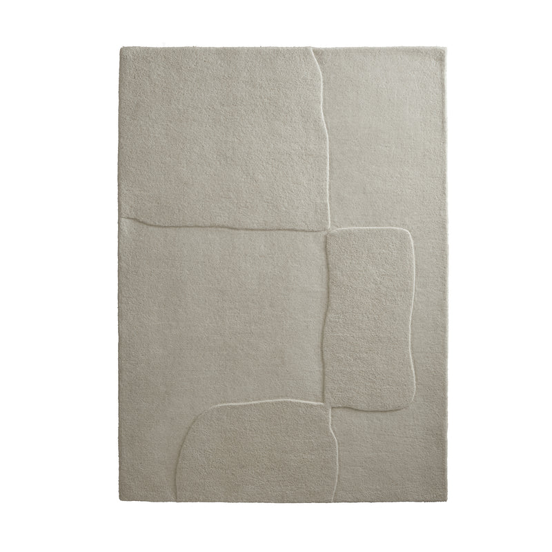 Sculptured Wool Boulder Rug- a 100% wool cut pile rug in Cream with a patterned design. 