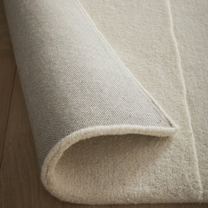 Sculptured Rug- 100% wool cut pile rug in Cream with a sculptured pattern. 