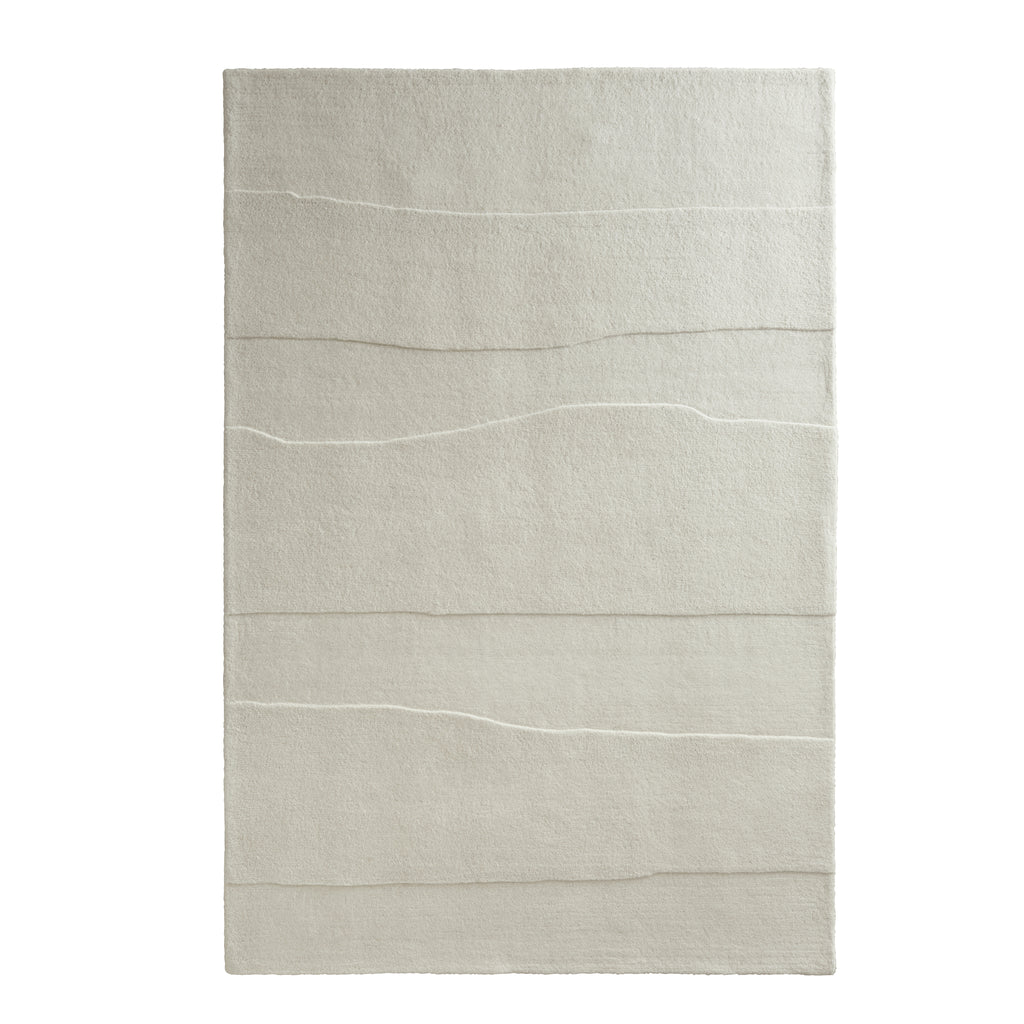 Sculptured Rug- 100% wool cut pile rug in Cream with a sculptured pattern. 