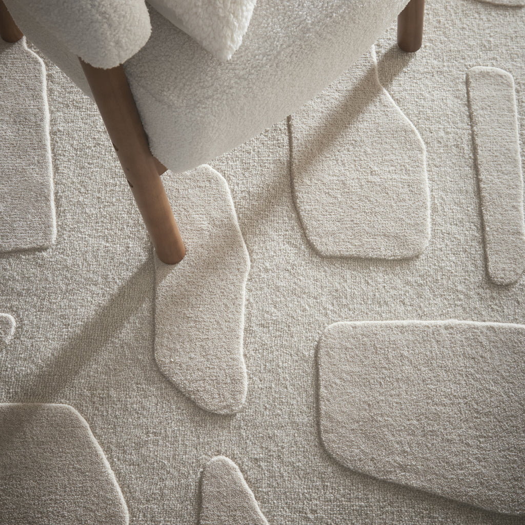 Sculptured Wool Stone Rug in Cream. 100% wool cut & loop pile rug in Cream with a patterned design. 